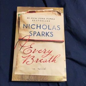 Reading book by Nicholas sparks